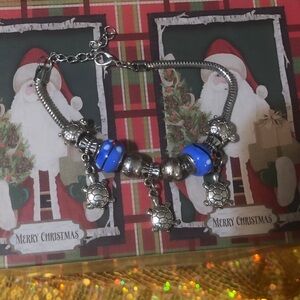 Silver Turtle Charm Bracelet with Blue Accents